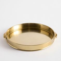 a round metal tray on a white background