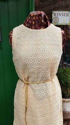 "Beautiful Vintage early 1960s crocheted dress with gold belt. Stunning piece that fits the size 8 mannequin really well,seems pretty straight from pit right down to hem. In an unworn condition with no marks or pills,fully lined with what feels like silk. Can be worn with or without the belt. Marked  as a size 36 which is about a uk 10. Perfect would be size 8 to 10 max. Measurements as follows are.  Shoulder-shoulder  Pit-pit (bust) 17&1/4\" Waist 16 &3/4\" Hips 18\" Pit-hem 30&1/2\" Nape-hem 37\" Width at hem 19&1/2\" inches  In as new condition  My Generation Vintage on FB and Instagram" Mod Scooter, Crocheted Dress, Leather Waistcoat, Mary Quant, Crochet Vintage, Summer Wedding Outfits, Gold Belt, 60s Mod, Dress With Belt