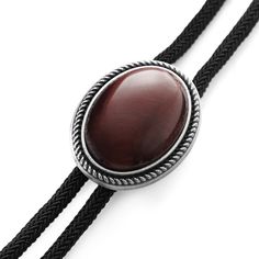 * Black cord with silver-tone tips 
 * Adjustable sliding clasp
 * Tiger’s Eye stone Black Adjustable Bolo Tie For Formal Occasions, Elegant Concho Bolo Tie, Elegant Adjustable Concho Bolo Ties, Silver Lariat Bolo Tie With Adjustable Cord, Adjustable Formal Bolo Tie With Concho, Formal Adjustable Concho Bolo Ties, Elegant Adjustable Bolo Ties For Formal Occasions, Adjustable Elegant Bolo Ties For Formal Occasions, Adjustable Western Bolo Tie For Formal Occasions