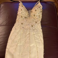 Beautiful Off White Beaded Mermaid Styled Evening Gown. Never Worn . Formal Gown With Beaded Straps For Prom Season, Champagne Embellished Mermaid Dress For Prom Season, Embellished Champagne Mermaid Dress For Prom, Beaded Prom Gown For Prom Season, Beaded Gown For Prom Season, Prom Season Beaded Gown, Beaded Gown For Prom, Beaded Gown With Fitted Bodice For Prom, Fitted Gown With Pearl Embroidery For Prom