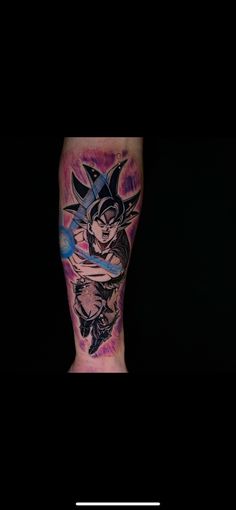 a man's leg with a dragon tattoo on it and an image of a person holding