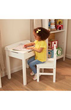 Whether making art, working on activity books or doing homework, kids can easily access the materials and implements stowed inside this lift-top wood desk. With the chair's 11-inch seat height, little legs can easily get into position and sit comfortably for hours of enjoyment on a rock-solid, easy-to-assemble design. Ages 3–8 26.4" x 18.5" x 6.9" 21 lb. Chair holds up to 150 lb. Safety-hinge lid Assembly required Wood/paint/metal Imported Kids' Wear Lift Top Desk, Child Desk, Playroom Chairs, Kids Study Desk, Kids Study Table, Kids Playroom Furniture, Desk And Chair, Simple Desk, Kids Study