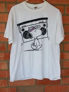 Snoopy Shirt With Boom Box In Clothing Shoes Accessori ShirtSnoopy Shirt With Boom Box In Clothing Shoes Accessori Shirt   This model reduces inventory waste and allows customers to create personalized designs. These t-shirts are made from high-quality materials and come in a range of sizes and colors, making them versatile for any occasion. Snoopy Clothes, Snoopy Shirt, Boom Box, Box Shoes, Light Blue Shirts, Dinosaur Print, Woodstock, White Tshirt