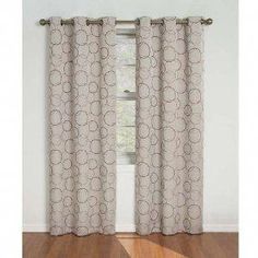 the curtains are hanging in front of a window with wood floors and hardwood flooring