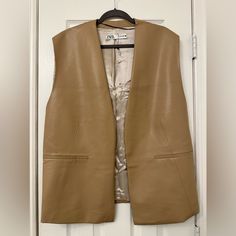 Size M Stain On The Back As Seen On Pic New, Tag Just Removed. Never Worn Brown Spring Vest For Workwear, Brown Vest For Workwear In Spring, Brown Spring Workwear Vest, Classic Brown Vest For Spring, Brown Leather Spring Vest, Brown Leather Vest For Spring, Fitted Brown Zara Leather Jacket, Zara Beige Vest For Fall, Chic Brown Zara Leather Jacket