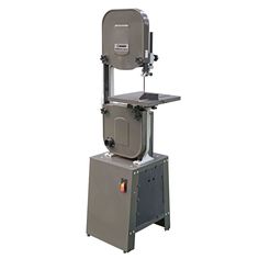 a machine that is sitting on top of a metal stand with the back facing up