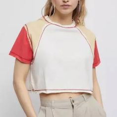 This Tee By Bdg Urban Outfitters Features A Crew Neckline, Short Sleeves, Rolled Trim, Cropped Boxy Fit, Colorblock Detailing At The Sleeves, And Topstitched Trim. Style: Shelby Color: Neutral Multi Size: Xs Brand New Without Tags Same Or Next Day Shipping Multicolor Crew Neck Top With Splicing, Multicolor Spliced Crew Neck Top, Trendy Tops With Contrast Color, Multicolor Spliced Tops For Summer, Summer Multicolor Spliced Top, Multicolor Spliced T-shirt For Summer, Cotton Tops With Contrast Short Sleeves, Cotton Tops With Contrast Sleeves And Short Sleeve, Red Patchwork Short Sleeve Tops