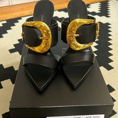 New In Box. Half Size Too Big For Me I Never Wore Them I Decide To Let Go I Wear Us7 37.5 In Versace Black Luxury Mules With Sculpted Heel, Luxury Black Mules With Sculpted Heel, Designer Mules With 4-inch Heel, Luxury Black Mules With Buckle Closure, Designer Mules With Buckle Closure For Formal Occasions, Designer Formal Mules With Buckle Closure, Luxury Mules With Padded Heel, Designer Black Mules With Buckle Closure, Luxury Open Heel Mules