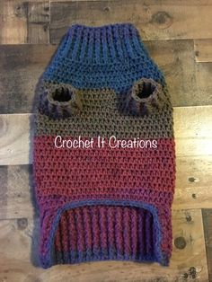 a crochet hat with eyes on it