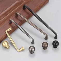 four different types of door handles and knobs