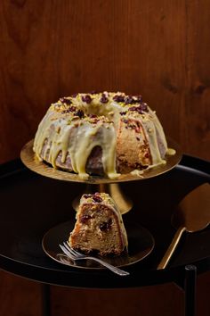 a cake sitting on top of a wooden table