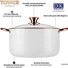 a large white pot with copper trimmings on the top and bottom, labeled in instructions