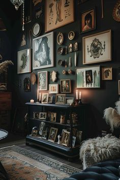 a living room filled with lots of pictures on the wall