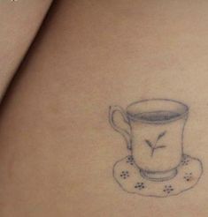 a woman's stomach with a cup on it