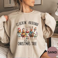 This Cute Christmas Chickens Sweatshirt is perfect for bringing festive cheer to your wardrobe! Featuring an adorable design of Christmas-themed chickens, this cozy sweatshirt is a must-have for any farm animal enthusiast. Whether you're a chicken lover or looking for a unique holiday gift, this Christmas Farm Animals Sweatshirt is ideal for spreading joy. The charming chicken print makes it a standout piece for the season, perfect for cozying up during winter festivities. Great as a Chickens Lo Christmas Farm Animals, Christmas Chicken, Chicken Print, Christmas Farm, Womens Christmas, Animal Sweatshirt, Unique Holiday Gifts, Chicken Lovers, Sweater Gift