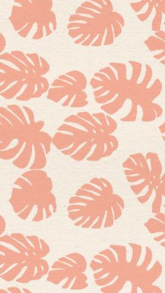 an orange and white wallpaper with large leaves on the back ground, in shades of pink