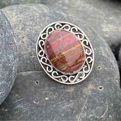 Sundance Sterling Silver Ring. Tumbled Jasper Stone Rock, Gorgeous Mix Of Natural Earthen Colors: Dark Earthen Red And Clay Brown, Orange Stripes With Streaks Of Green In A Round Oval Shape. Raised Silver Setting, Carved Textured Framing With Blacken Grooves For Contrast, Highlighting Organic Striations In Mother Nature. Great Gift Ring Size 9 (1006) Sundance Catalog Boutique Ring Women’s Jewelry Collection Solitaire Gem Stone Heirloom Band Sterling Silver Jasper Birthstone Birthday Oversized Ch Sundance Jewelry, Jasper Ring, Unique Bands, Sundance Catalog, Friendship Love, Red Gemstones, Jasper Stone, Ring Women, Gift Ring