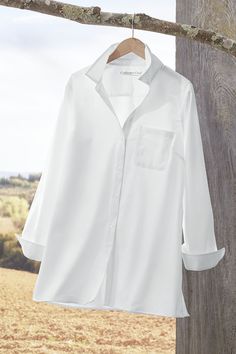 Great news for no-iron! Our new, lighter fabric has the wrinkle-free ease you love, with a softer, drapier feel. Longer length provides great coverage. Cotton Tunic Tops, Womens Knit Tops, Long Dress Casual, Women Tunic Tops, Tunic Styles, Women Shirts Blouse, Coldwater Creek, Tunic Length, White Shirts