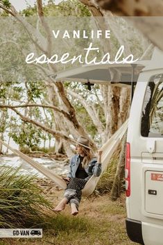 a woman sitting in a hammock with the words vanlife in australia above her