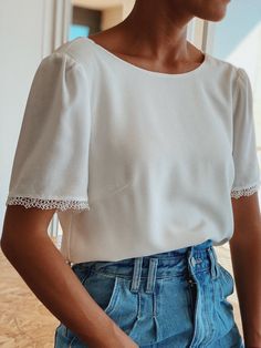 Chic Short Sleeve Blouse With Lace Patchwork, Elegant Summer Tops With Button Back, Elegant Button Back Summer Tops, Elegant Summer Top With Button Back, Chic Blouse With Lace Cuffs For Work, Chic Summer Blouse With Button Back, Chic Blouse With Lace Puff Sleeves, Feminine Lace Top Blouse, Chic Short Sleeve Tops With Lace Collar