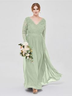 a woman in a long green dress holding a bouquet