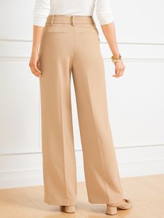 Introducing the Talbots Weston Pant. Featuring a flattering high waist and chic wide leg. Beautifully tailored with of-the-moment pleats–for a fresh, modern, irresistible fit. Timeless stretch crepe fabric looks great any day of the week. Features Pleat Front/Trouser Wide Leg Hits Above Waist Full Length Fly front with hook & bar closure Front Slash, Back welt pockets Imported Fit: Misses: 31"; Petite: 28 1/2"; Plus: 31"; Plus Petite: 28 1/2" Material: 91% Polyester, 9% Spandex Care: Machine Was Classic Style Women, Stretch Crepe, Pleated Pants, Day Of The Week, Crepe Fabric, Welt Pockets, Fashion Pants, Looks Great, Full Length