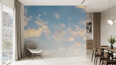 a dining room with a sky mural on the wall