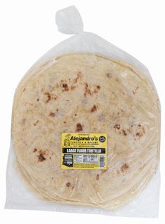 a tortilla wrapped in plastic on a white background