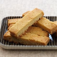 several pieces of cake sitting on a plate