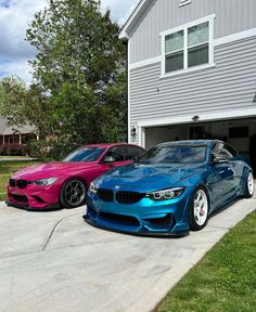 two cars parked in front of a house