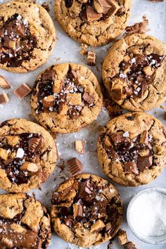 chocolate chip cookies are arranged on a baking sheet