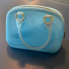 Mini Jelly Handbag From Lily Rain. Never Used. Trendy Blue Shoulder Bag For Gift, Trendy Light Blue Satchel Bag, Handheld Blue Shoulder Bag For On-the-go, Blue Handheld Shoulder Bag For On-the-go, Chic Blue Bag For Gift, Chic Blue Shoulder Bag Gift, Chic Blue Shoulder Bag For Gift, Trendy Light Blue Bag For Gift, Blue Handheld Bag With Zipper Closure