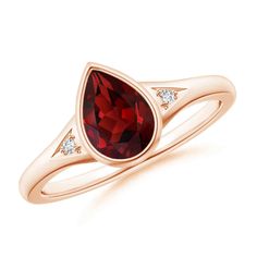 Bezel-set on a polished wide shank is the pear-shaped garnet that exudes a radiant deep red hue. It is flanked by diamond accents that are nestled within the cutout grooves of the shank. This 14K Solid Gold pear garnet ring will take your breath away with its sophisticated allure. Birthstone for the month of January and traditional gemstone gift for 2nd, 15th & 29th wedding anniversaries. All our items are packaged with care in appealing boxes with plush interiors. Available in various sizes bet 14k Rose Gold Filled Ring, Rhodolite Garnet Ring, Gold Filled Ring, Garnet Ring, American Diamond, Garnet Rings, Garnet Gemstone, Rings For Her, Topaz Ring