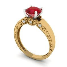 a gold ring with a red stone in the center and two diamonds on each side