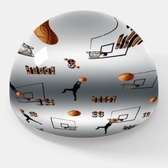 a glass plate with basketballs and people on it