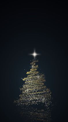 a christmas tree made out of gold and white lights on a black background with the star above it