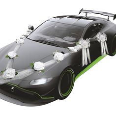 a sports car decorated with white flowers and ribbons for a wedding or special occasion, on a white background