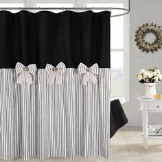 black and white striped shower curtain with bows