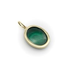 This is part of Chairish’s Fine Jewelry assortment.  Part of our signature collection, we bezel set a malachite in 14k gold to create an oval-shaped pendant. When working with malachite—a green gemstone known for its beautiful layers—we search for pieces with something special about their patterning or symbolism. This one has concentric circles that draw you in as you look at the stone.   Malachite is healing stone connected to the heart chakra. It opens the heart to transformation and unconditional love, and can be used for strength and courage during times of change. It is also said to absorb negative energy and offer protection from energies and pollutants in the environment.   The pendent measures 1” x 3/4”, with an additional 5 x 8 mm bail. It weighs 6.3 grams. Unmarked, but acid test Concentric Circles, Green Gemstones, Accessories Jewelry Necklace, Gold Wire, Healing Stone, Metal Pendant, Circle Pendant, Signature Collection, Heart Chakra