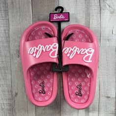 Barbie Women's Mattel Beach Slides Sandals Slip-On Logo Pink Size 6 New With Tag. Sandals In Photos Are The Exact One You Are Purchasing. Please Examine The Photos Entirely As They Are Part Of The Details. -Size: 6 -Color: Pink -Slip-On -Rubber Outsole Due To Variations In Phone Displays Or Computer Monitor Settings And The Light Brightness When Taking Photos, The Real Color Of The Item May Be Slightly Different From The Photos Shown. Message Me If You Have Any Questions! All Items Are Shipped T Eva Slip-on Sandals For Vacation, Flat Eva Sandals For Vacation, Summer Slip-on Synthetic Flip Flops, Non-slip Round Toe Flip Flops For Beach Season, Beach Sport Sandals With Round Toe, Spring Beach Sport Sandals Made Of Eva, Pink Open Toe Eva Slippers, Non-slip Round Toe Sandals For Beach Season, Open Toe Eva Sandals For Beach Season