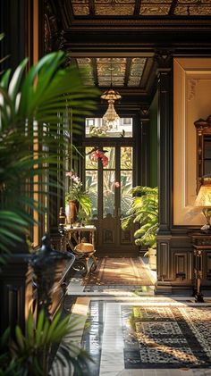 an ornate entry way with potted plants on either side