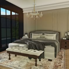 a bedroom with a large bed and chandelier