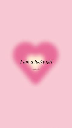 a pink heart with the words i am a lucky girl