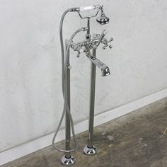 the shower head and handset are connected to each other with two hoses attached