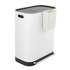 a white and black trash can with a paper towel dispenser