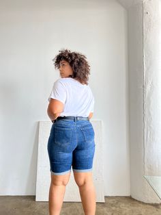 Comfortable and modest, the Plus Size Cuffed Bermuda Denim Shorts are easy to throw on with a t-shirt or blouse for a casual outfit. Grab your favorite sneakers and a cute tote and you'll be ready to head to the beach or run some errands. These shorts feature cuffed bottom hems that are sewn in place, five functional pockets and 5 belt loops, a zipper fly, and a single button closure. The material is a very stretchy denim. These shorts are made from 88% cotton, 8% polyester, and 4% spandex. Mach Trendy Denim Jean Shorts For Everyday, Casual Everyday Denim Shorts, Everyday Casual Denim Shorts, Casual Denim Shorts For Everyday, Casual Stretch Medium Wash Jean Shorts, Casual Stretch Jean Shorts In Medium Wash, Trendy Blue Jean Shorts For Everyday, Casual Everyday Jean Shorts, Casual Cotton Jean Shorts For Everyday