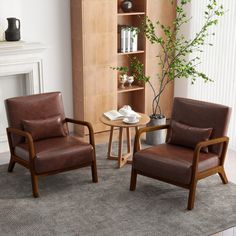 two chairs and a table in front of a bookcase with books on it,