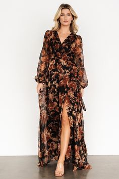 Elevate your style with our Maura Wrap Maxi Dress in Black Print! This long-sleeve chiffon dress is a true wrap style with a cute floral pattern that you'll love. V-neck Chiffon Maxi Dress With Tie Waist, Floral Print Wrap Dress With Surplice Neckline For Fall, Brown Floral Print V-neck Maxi Dress, Brown V-neck Maxi Dress With Floral Print, Wrap Maxi Dress Long Sleeve, Long Sleeve Chiffon Dress, Floral Wrap Maxi Dress, Mother Of The Bride Dresses Long, Print Chiffon Dress