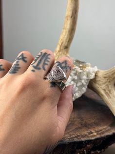 This chunky-sized ring features a pink Sonoran Dendritic Rhyolite set in fine and sterling silver. It has a matte finish and is a size 9 Nature-inspired Jewelry For Healing With Natural Inclusions, Unique Healing Rings With Natural Inclusions, Nature-inspired Ring With Natural Inclusions, Nature-inspired Rings With Natural Inclusions For Promise, Nature-inspired Silver Rings With Natural Inclusions, Nature-inspired Promise Rings With Natural Inclusions, Nature-inspired Jewelry With Natural Inclusions For Anniversary, Nature-inspired Jewelry For Anniversary, Gender Neutral Style