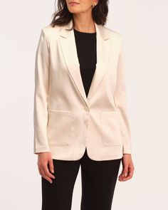 Indulge in luxury with the Truth women's satin single breasted blazer. With a peak lapel and one-button closure, this jacket exudes sophistication and elegance. Crafted from a comfy stretch woven satin, it also features open patch pockets for a modern look. Elevate your wardrobe with this exclusive piece for under $60. Peak lapel Long sleeve Single breasted One-button front Open patch pockets Woven satin Stretch fabric Dry clean only Size + Fit About 28" from shoulder to hem Model measurements: Single Breasted Blazer, Peak Lapel, Breasted Blazer, Affordable Luxury, Exclusive Collection, Model Measurements, Front Open, The Truth, Single Breasted